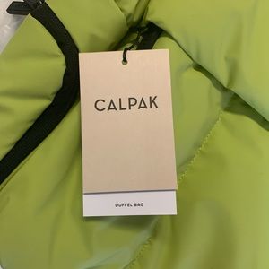 Calpak Luka Duffel in Celery